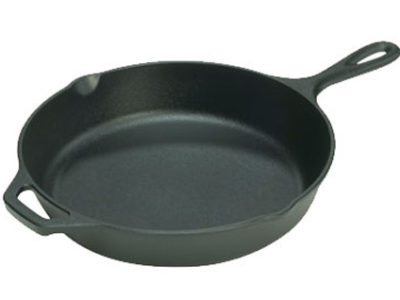 A black cast iron skillet on a white background.