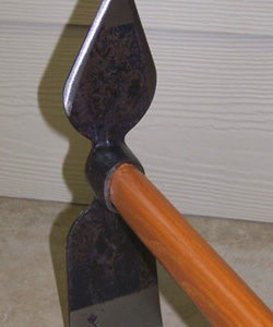 A small Double Chopper with a wooden handle.