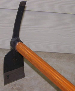 An Double Chopper with a wooden handle and a wooden handle.