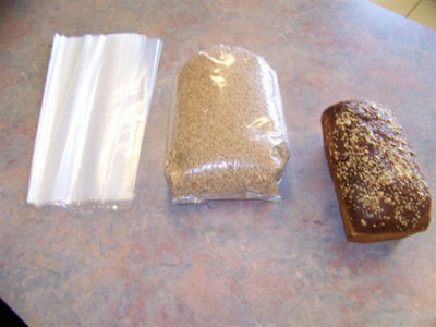 A loaf of bread and a bag of seeds.